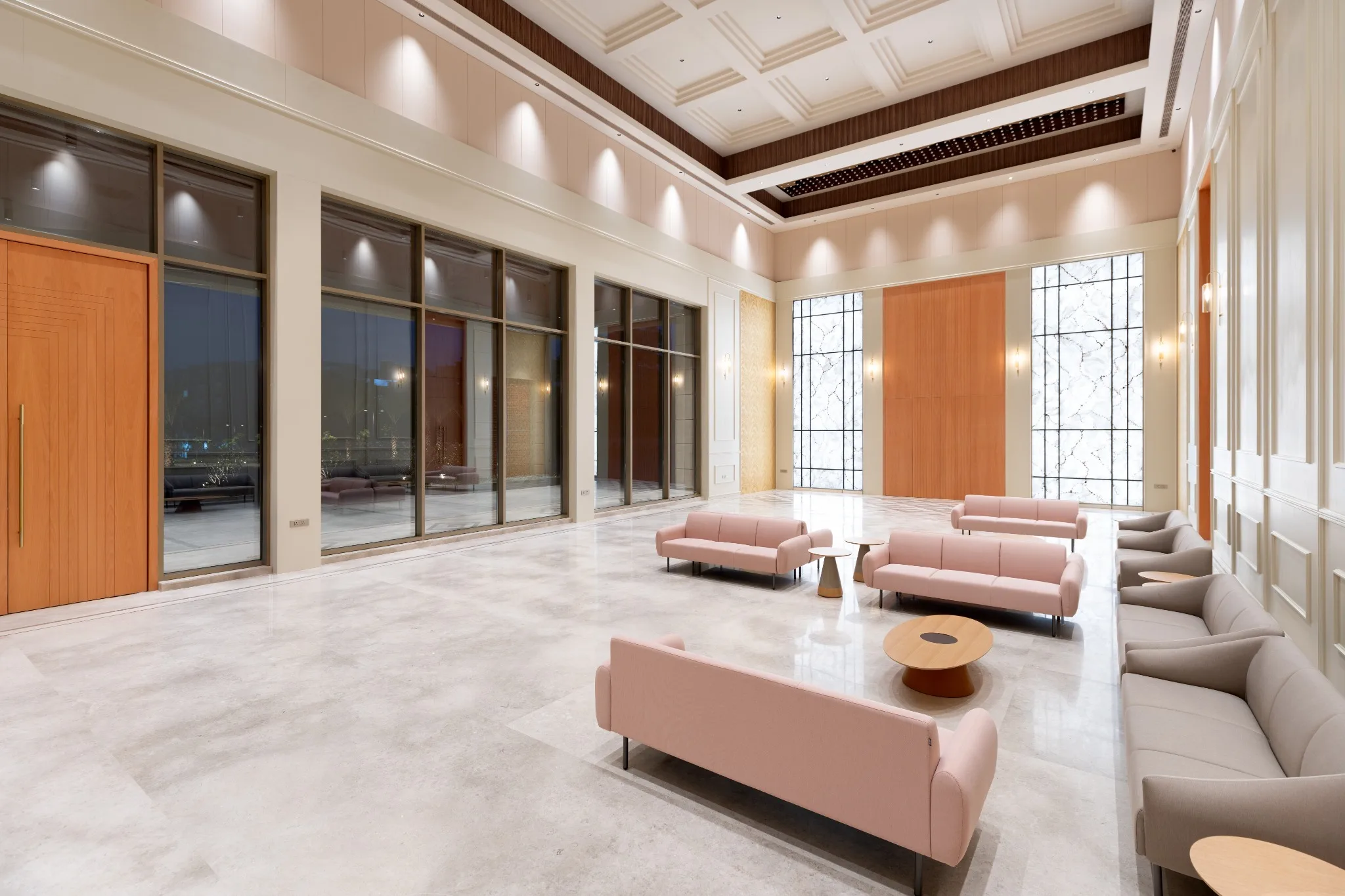 MOMENTUS exterior entry drive at dusk